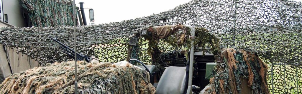 Military camouflage net for tactical vehicle concealment