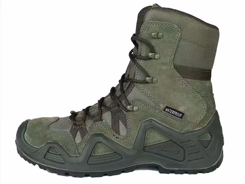A pair of military green tactical boots