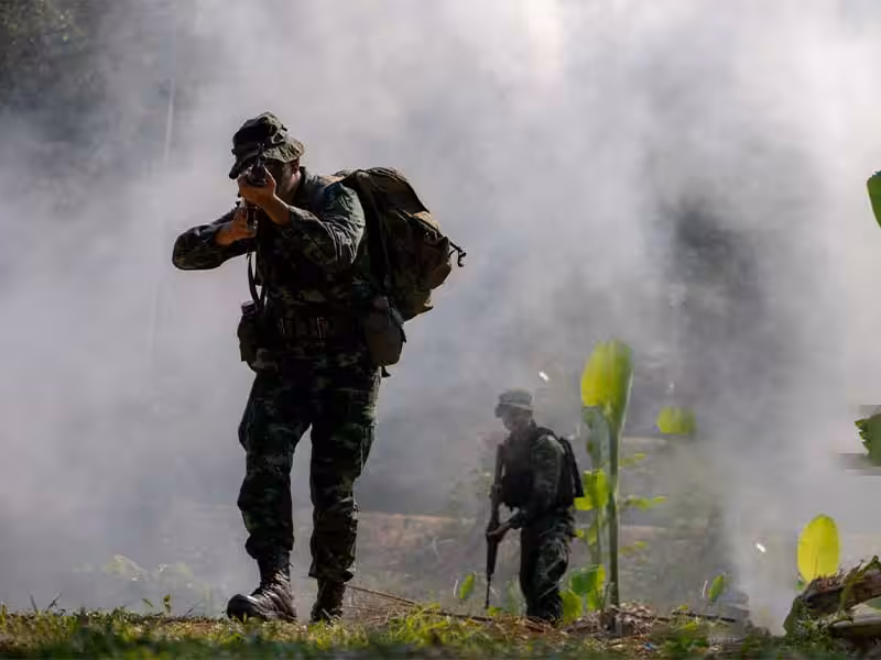 Two soldiers participating in training.
