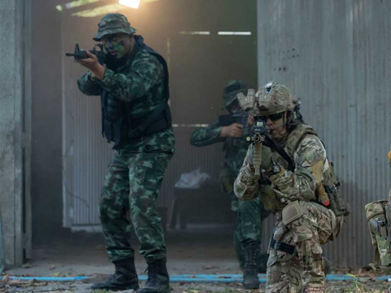 Three soldiers in training