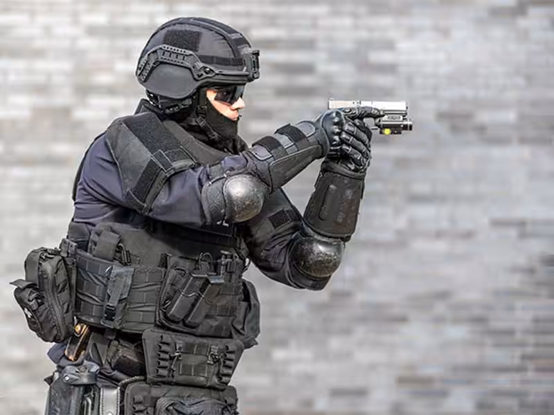 A soldier holding a gun.