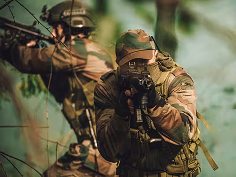 Two soldiers holding guns