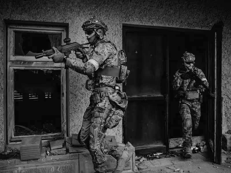 Two soldiers holding guns