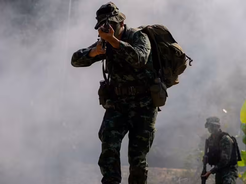 A soldier carrying a backpack