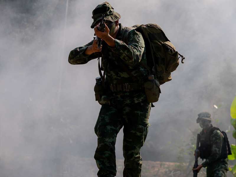 A soldier carrying a backpack